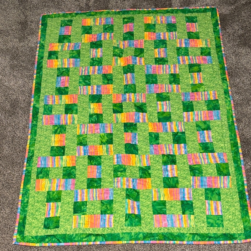 Handmade patchwork Baby Quilt, pinks, blues, yellows, for a crib, toddler bed.